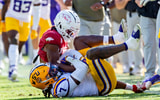 LSU LB Harold Perkins intercepts a pass vs. Arkansas (Photo: © Stephen Lew-Imagn Images)